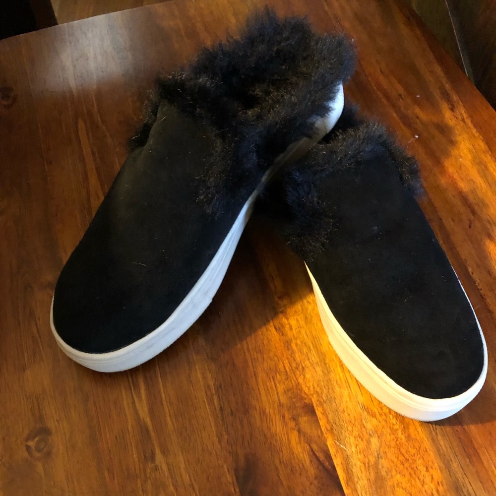 Black genuine suede fur lined sneaker mules.